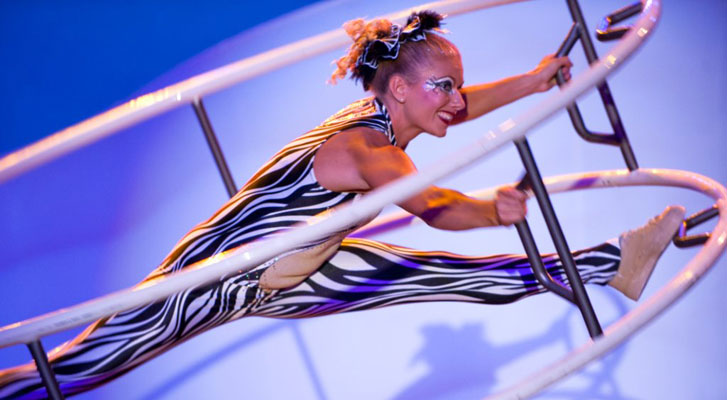 Image: Dancer performs at a corporate event. Event Design and metting development at Benchmarc360.